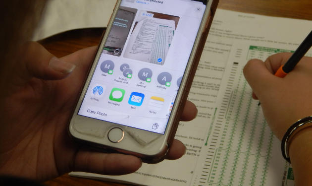 Students taking a quiz on their mobiles